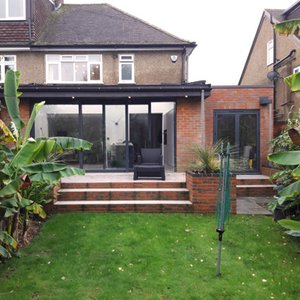 Brick and zinc extension to house in Watford